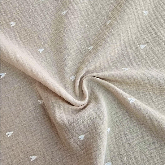 Mussola cuoricini beige